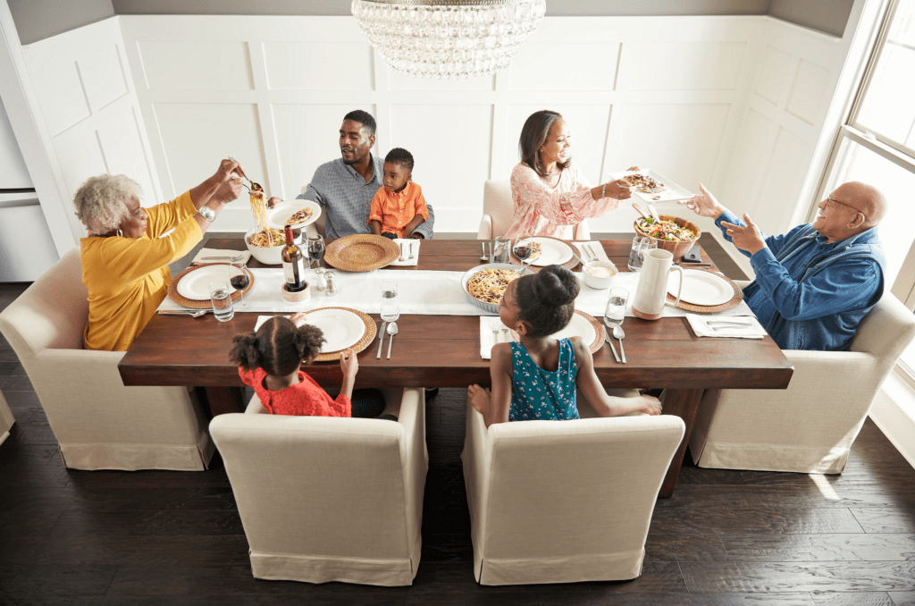 Family having breakfast at the dining table | Floors By Roberts